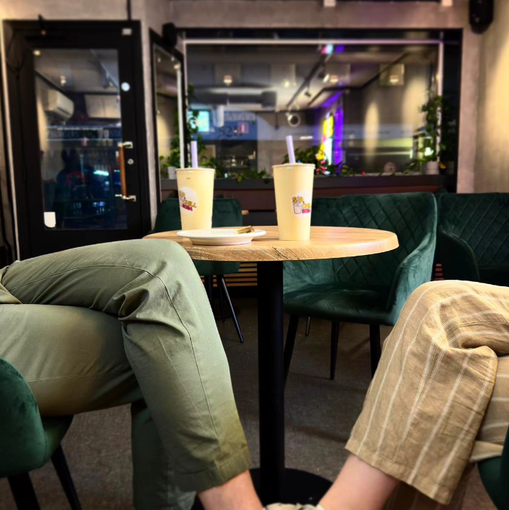 two pepole drinking Boba Drink